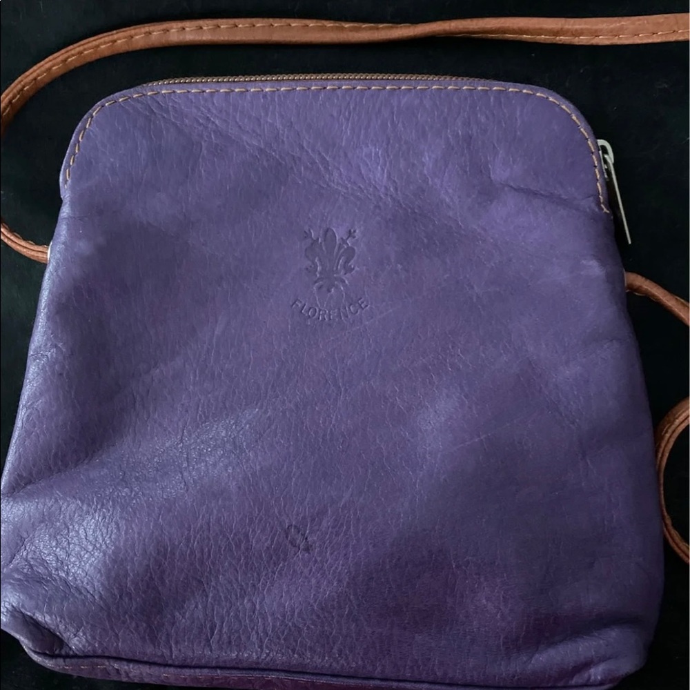 Small purple leather purse from Florence